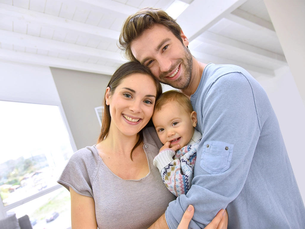 Smiling family representing general and preventive dental care